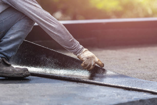 Professional Waterproofing technician working in Selden, NY